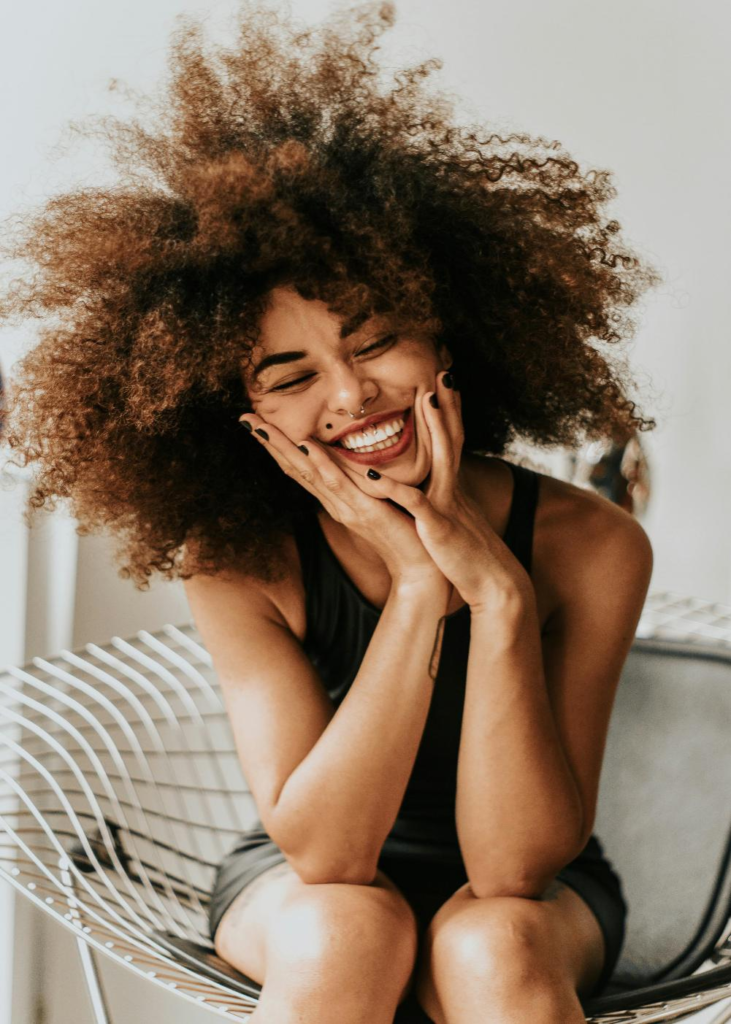 A woman smiling