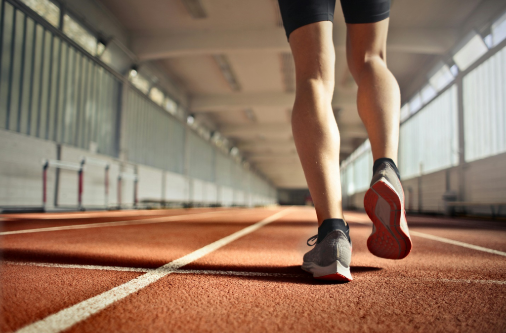 An athlete running during training on a track